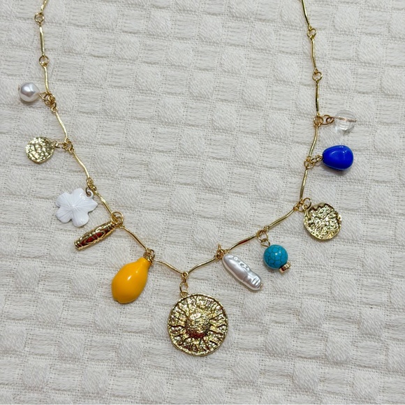 NEW Gold Tone Charm Necklace with Sun Medallion, Pearl & Turquoise Blue Accents - Picture 6 of 9